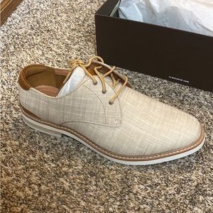 Men’s size 10.5 beige dress shoes. Never worn from Men’s Wearhouse
